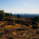 A rocky outcrop with a view near the top of Mount Finlayson.